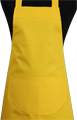 Detail foto van Hobbyschort met zak extra breed en 100 cm lang. Deze schort is ideaal voor zowel de professionele kok als hobby kok. - Geel